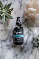 Tattoo Goo cleansing soap foam showing rich lather for tattoos and piercings.