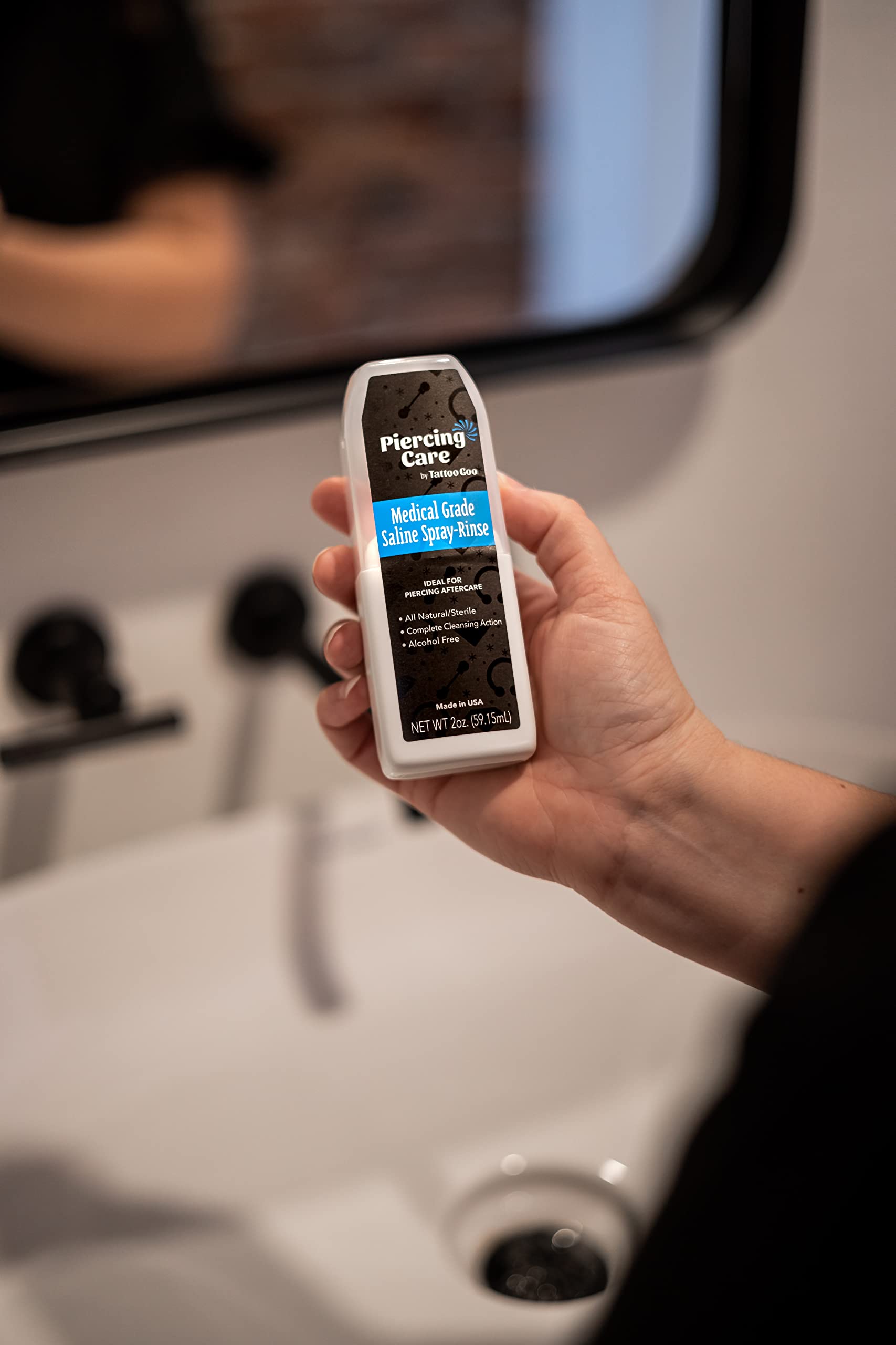 Tattoo Goo saline spray mist action ensures even coverage for precise daily cleansing of piercings.
