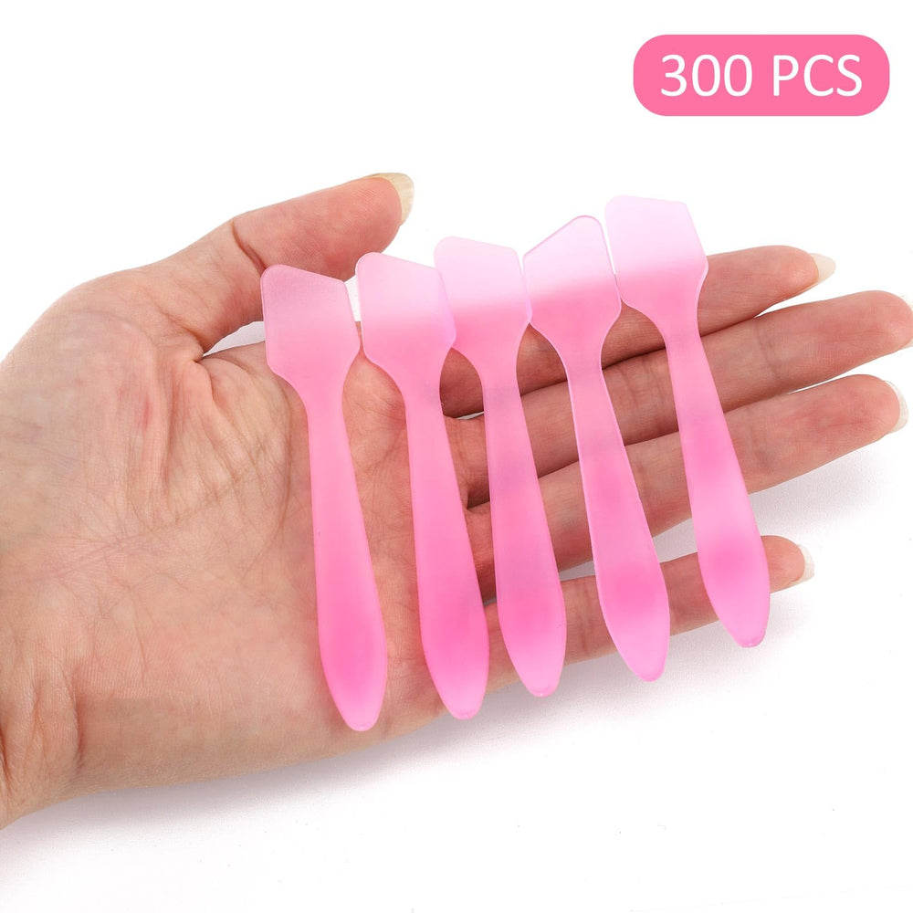 Tbestmax 300pcs pink spatulas in a count display for easy stock-up