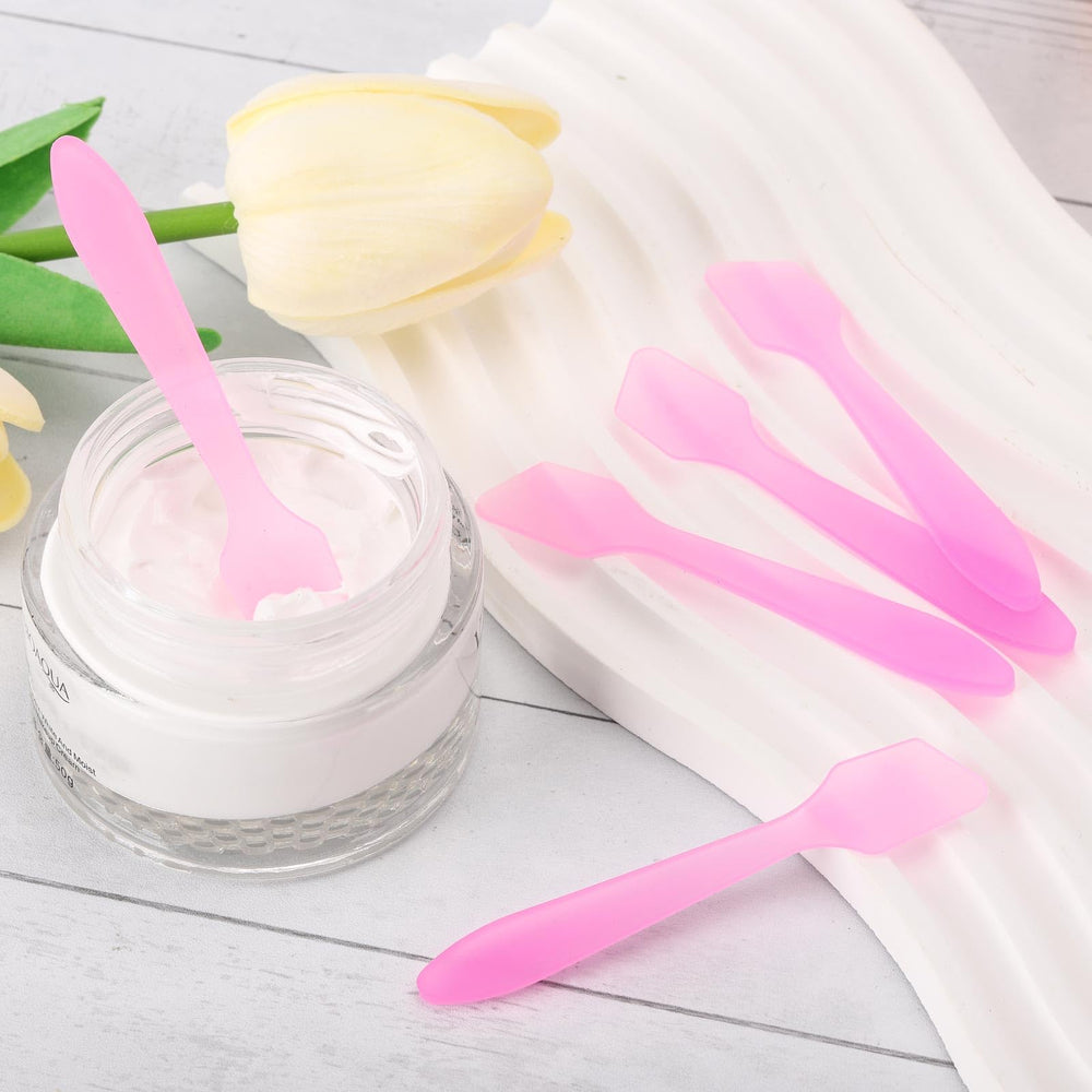 Tbestmax spatula for facial masks shown beside jar