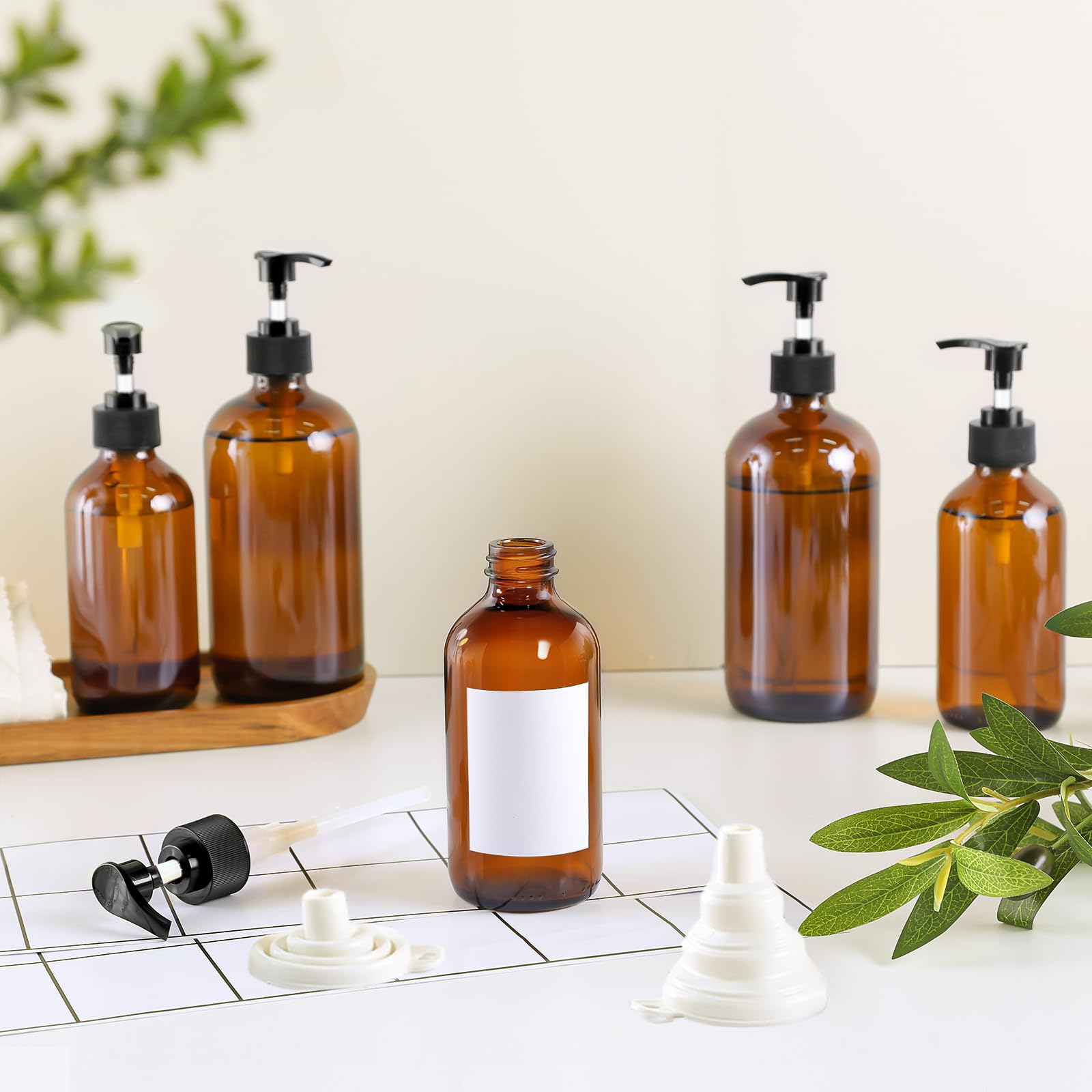 TBWIND amber glass bottle pump top close-up for smooth liquid flow.