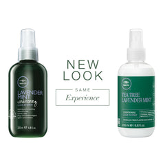 Tea Tree Lavender Mint Leave-In Spray in hand for easy application.