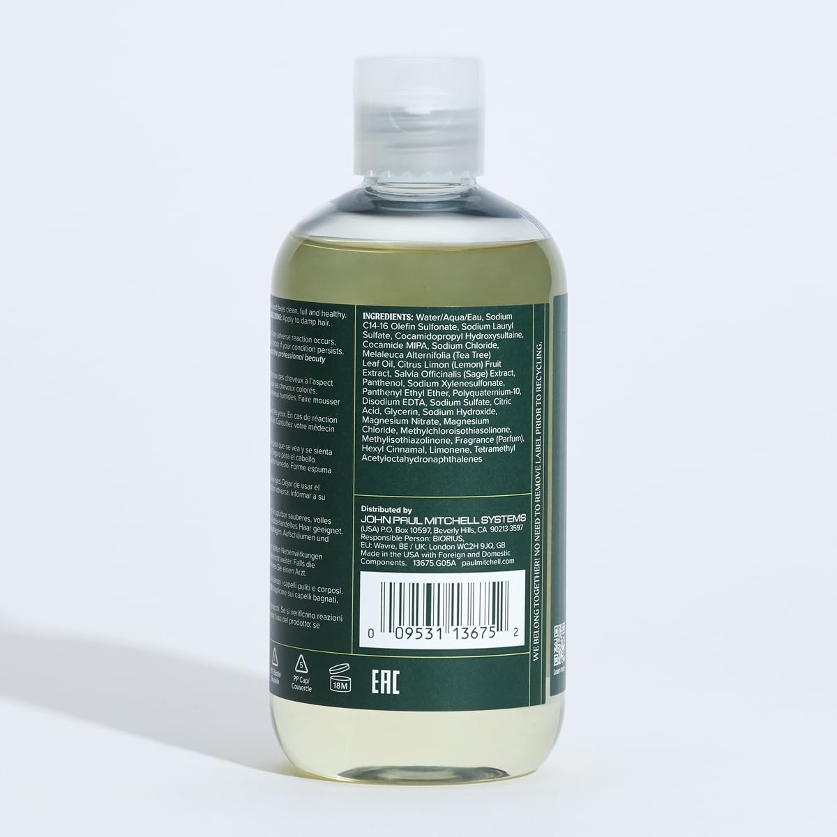 Packaging variation for Tea Tree Lemon Sage Shampoo on display.