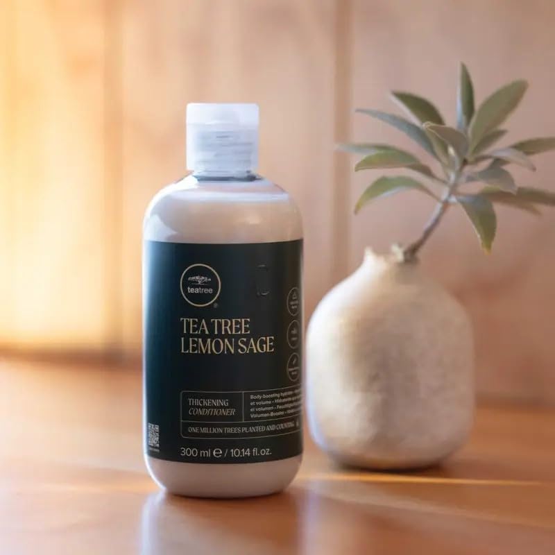 Tea Tree Lemon Sage Thickening Conditioner texture close-up reveals creamy formula