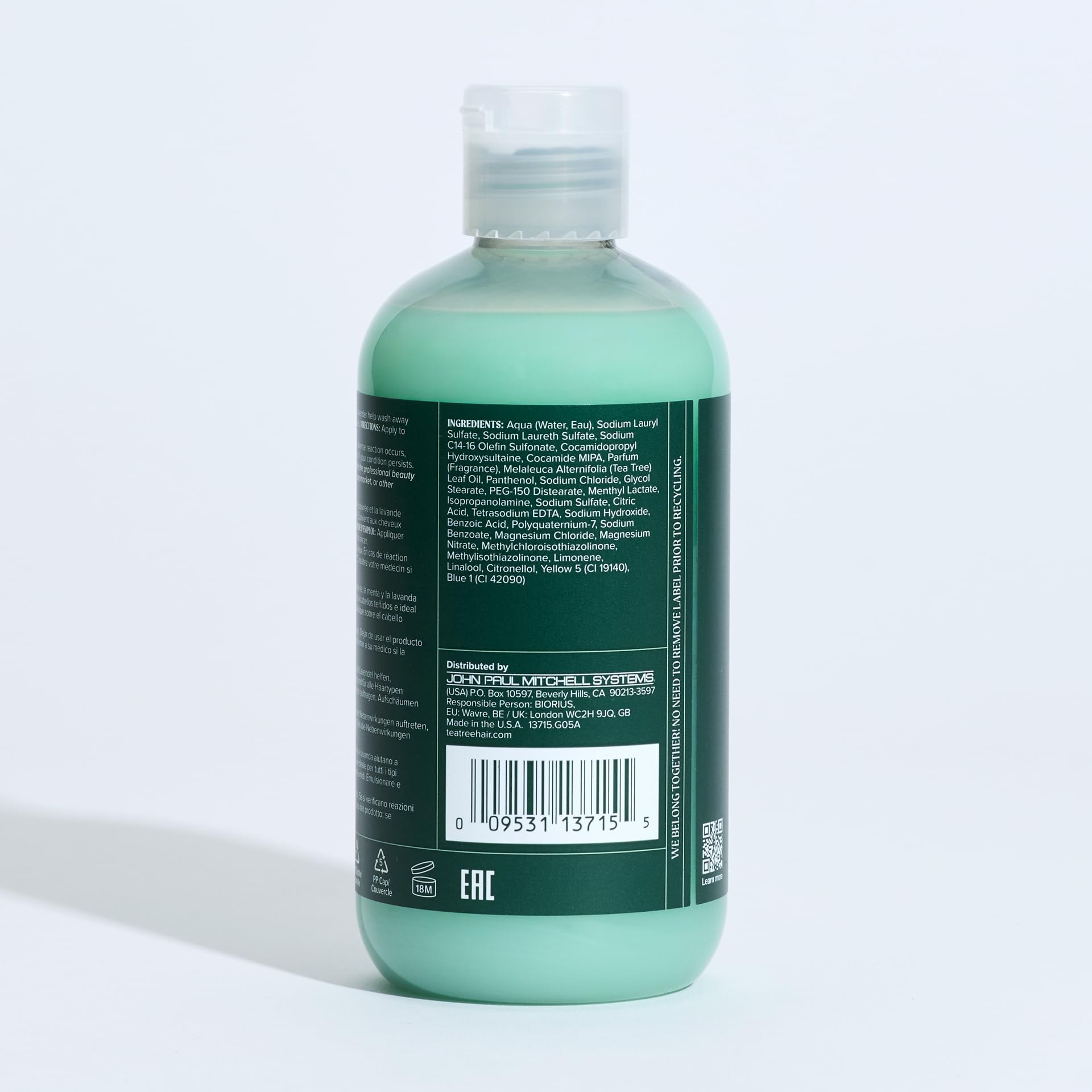 Tea Tree Special salon display features professional-grade scalp care product.