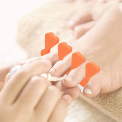 Worn on toes during a manicure to keep toes apart and prevent smudges.