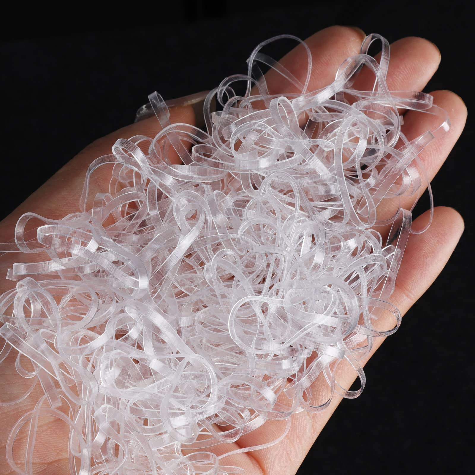 Teenitor clear hair elastics on braid demonstrating secure, flexible hold.