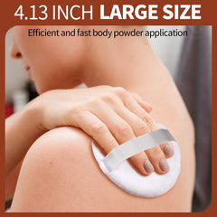 Teenitor powder puff with ribbon handle offers easy grip.