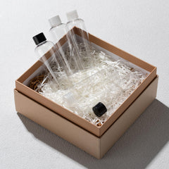 Tekson bottle with black screw cap shown for secure closure