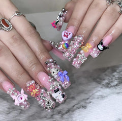 TemBelle kawaii cat charms elevate playful nail art with shimmer.