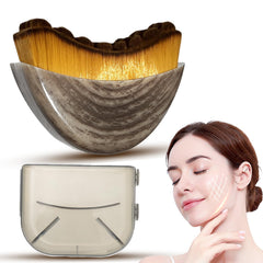 Temebr Lymphatic Contour Face Brush shows ergonomic design for drainage routines.
