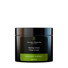 The Art of Shaving Bergamot & Neroli shaving cream jar shows rich lather for a smooth shave.