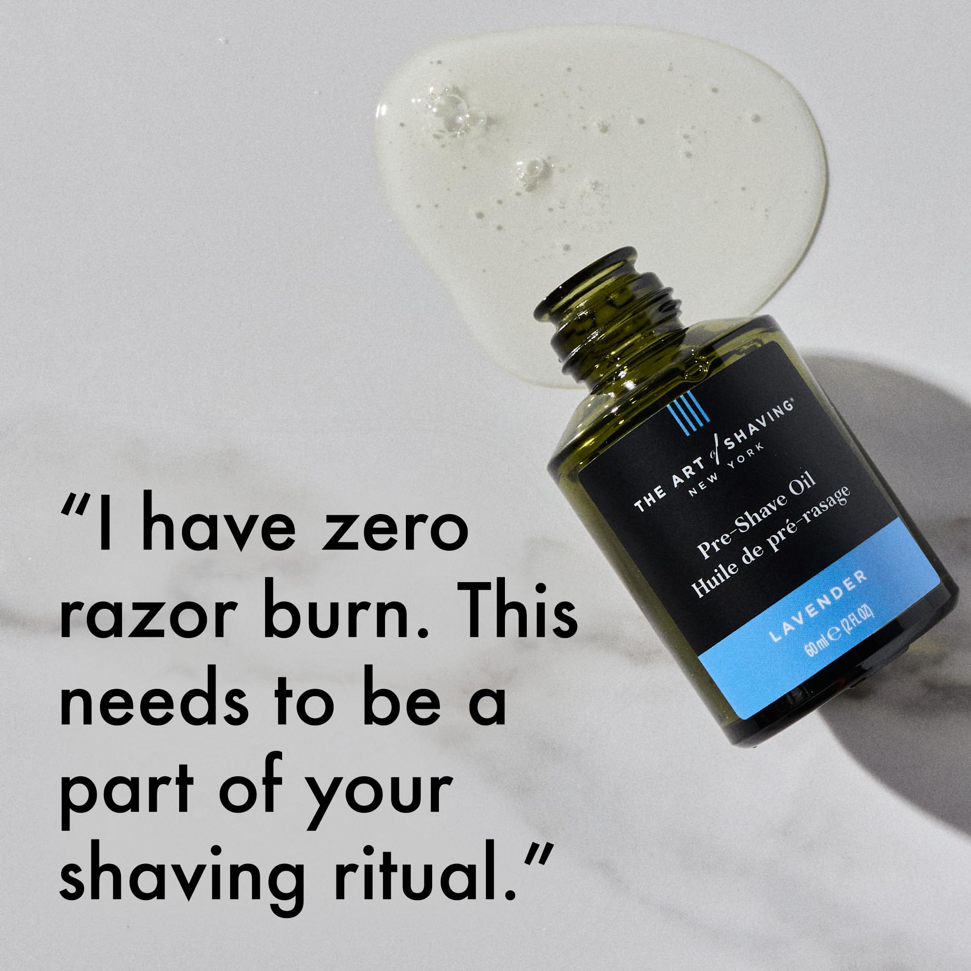 The Art of Shaving pre-shave oil bottle detail emphasizes quality and brand heritage.