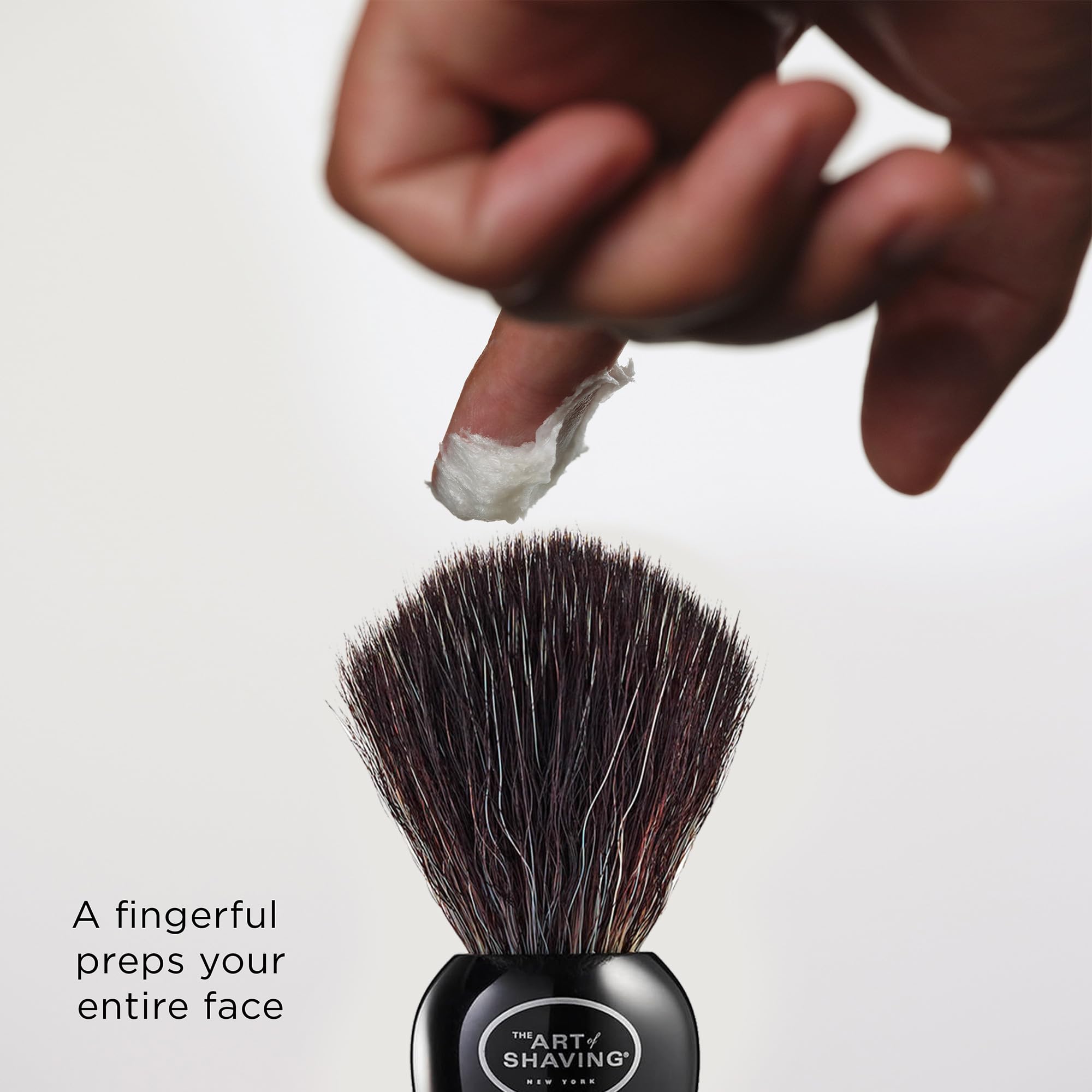 A generous dollop of The Art of Shaving sandalwood cream creates rich foam