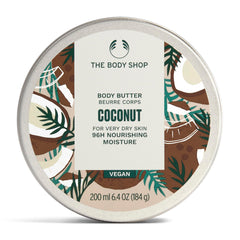 The Body Shop Coconut Body Butter jar close-up shows creamy texture and glow