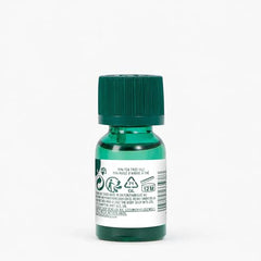 The Body Shop Tea Tree Oil: aplicación de dos gotas para control diario de imperfecciones.