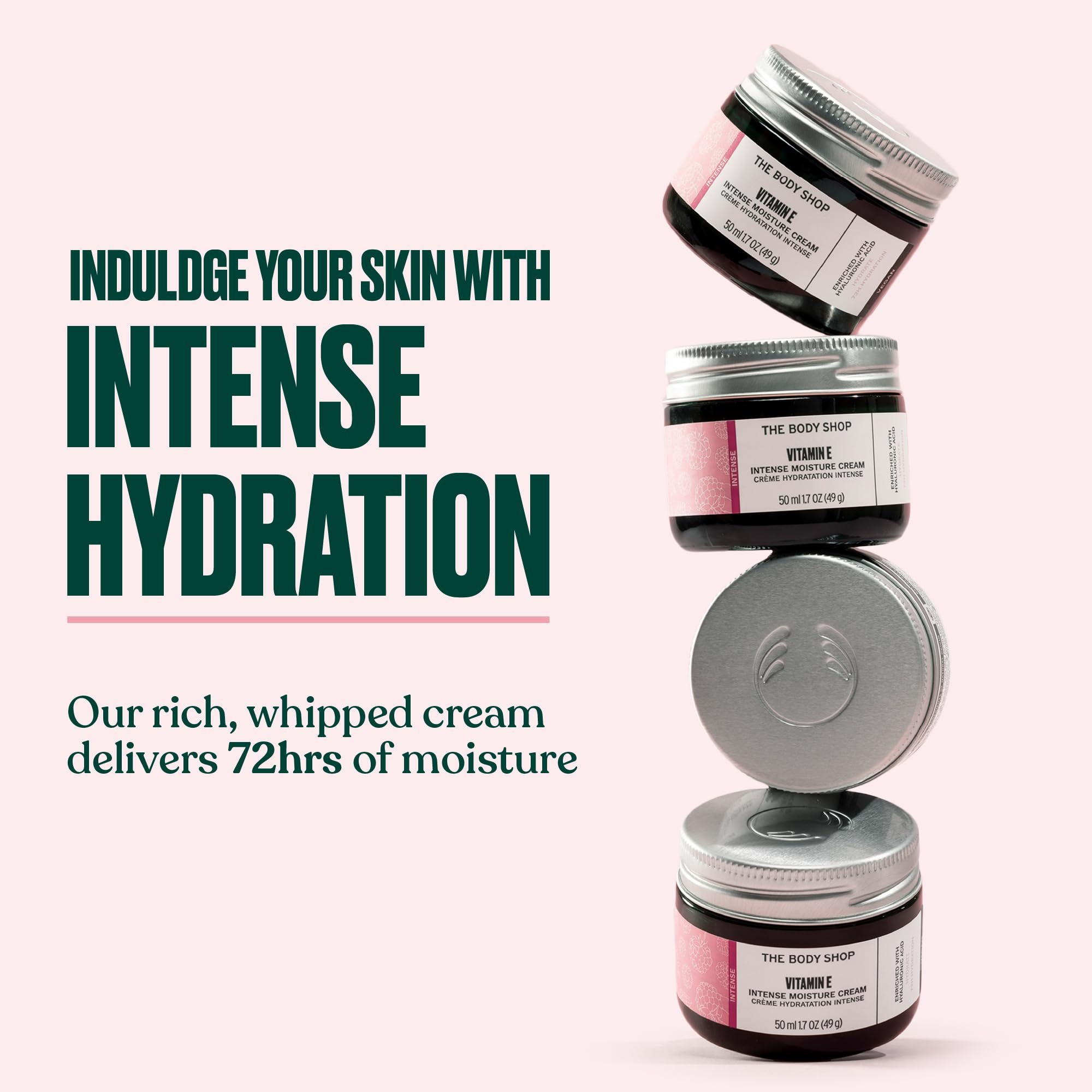The Body Shop Vitamin E Intense Moisturizer texture close-up showing silky, non-greasy feel.