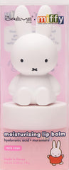 The Crème Shop Miffy bálsamo labial colorido aplicado en labios, tono rosado suave.