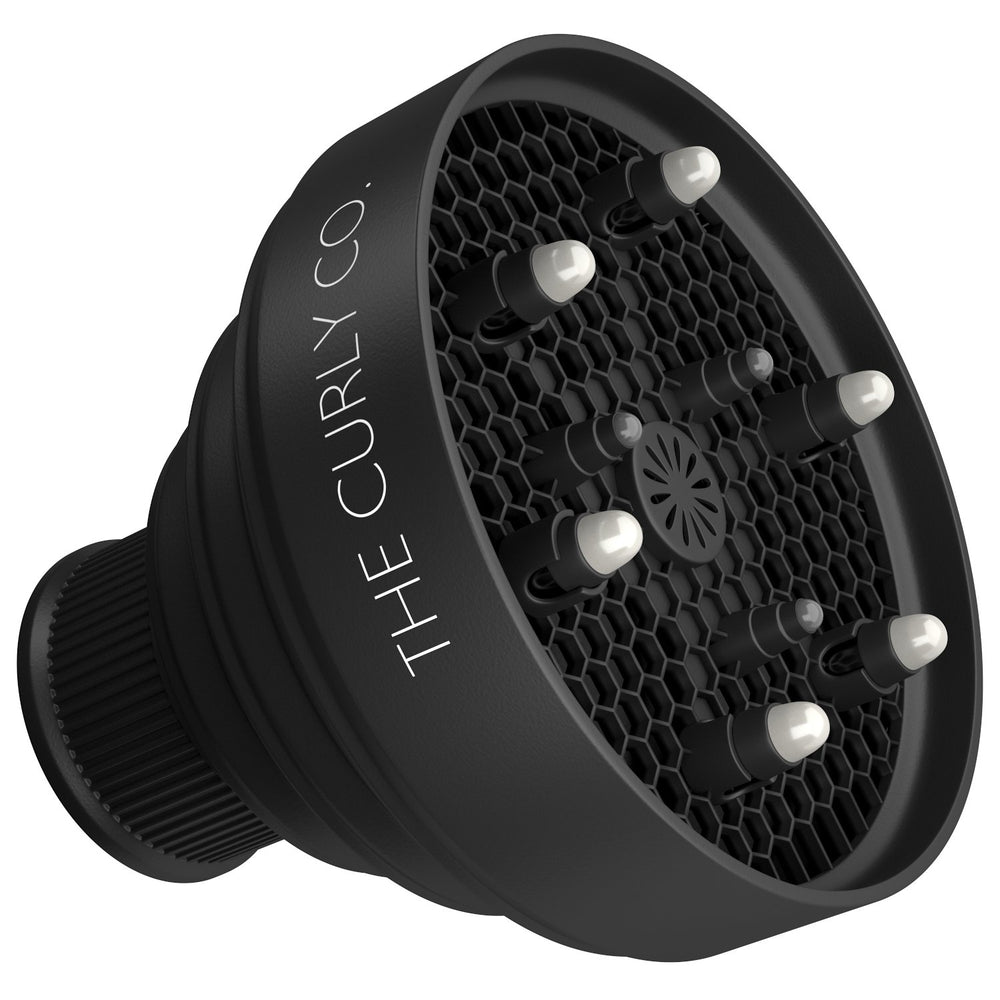 The Curly Co collapsible diffuser attached to a standard dryer for even airflow.