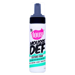 The Doux Mousse Def Texture muestra aplicación rápida para rizos definidos y suaves.