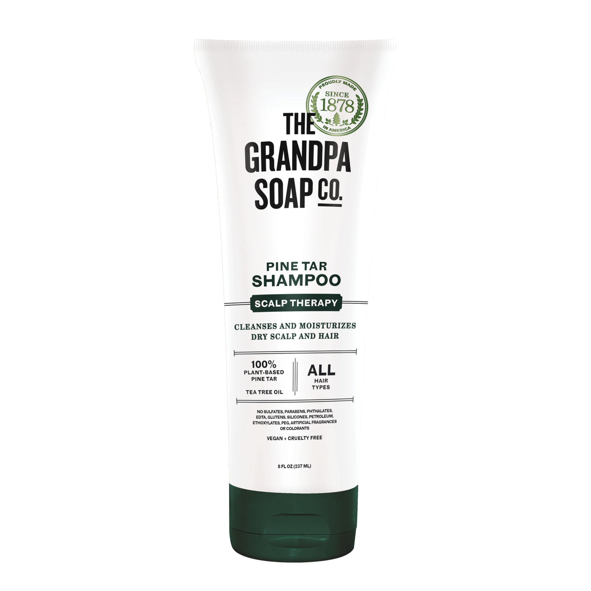 The Grandpa Soap Company Pine Tar Shampoo bottle highlighting pine tar and tea tree for dry scalp care.