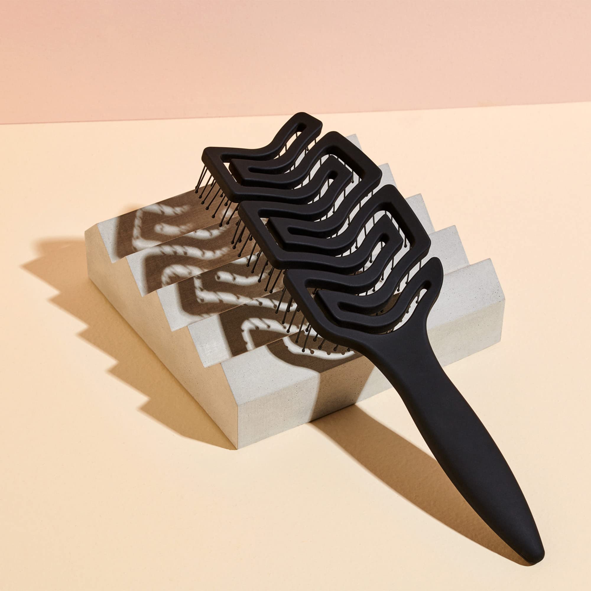 The Hair Edit detangle brush non-slip grip stays secure while wet.