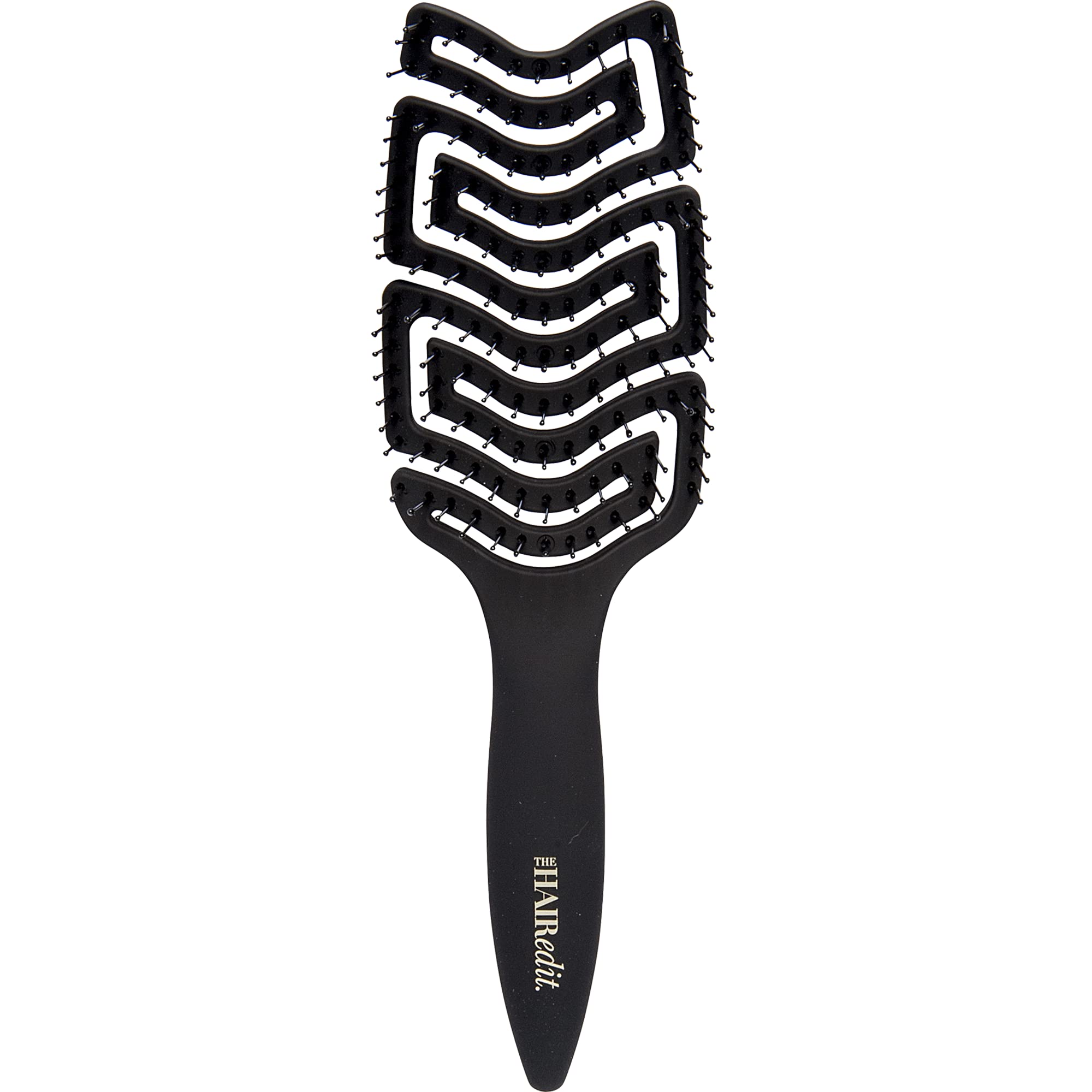 The Hair Edit detangle brush glides through wet hair for gentle detangling.