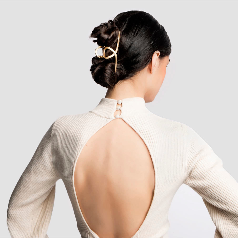 The Hair Edit Giro Francés, construcción metálica resistente para uso diario.