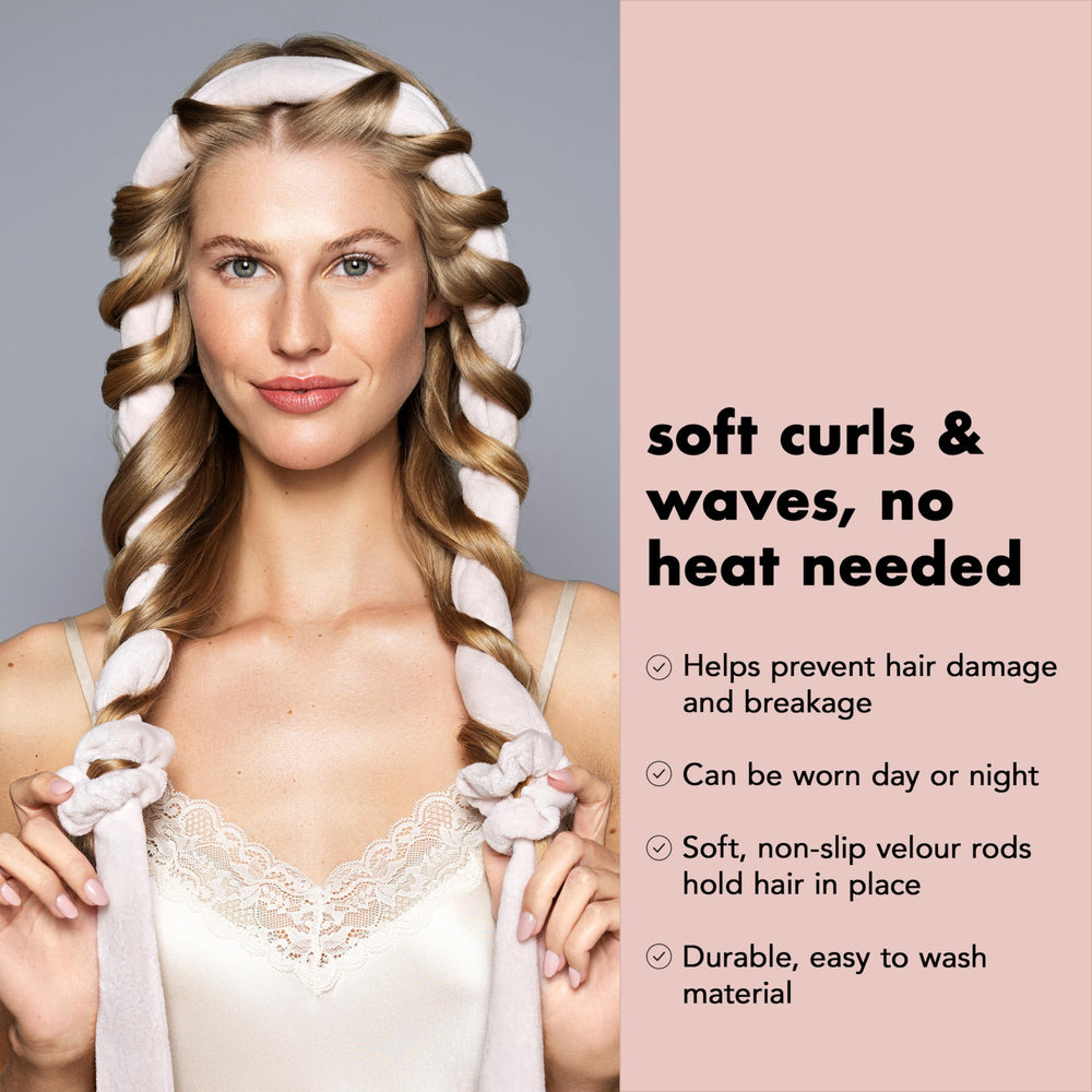 The Hair Edit heatless ribbon curling rod gently guides long hair into smooth, consistent curls.