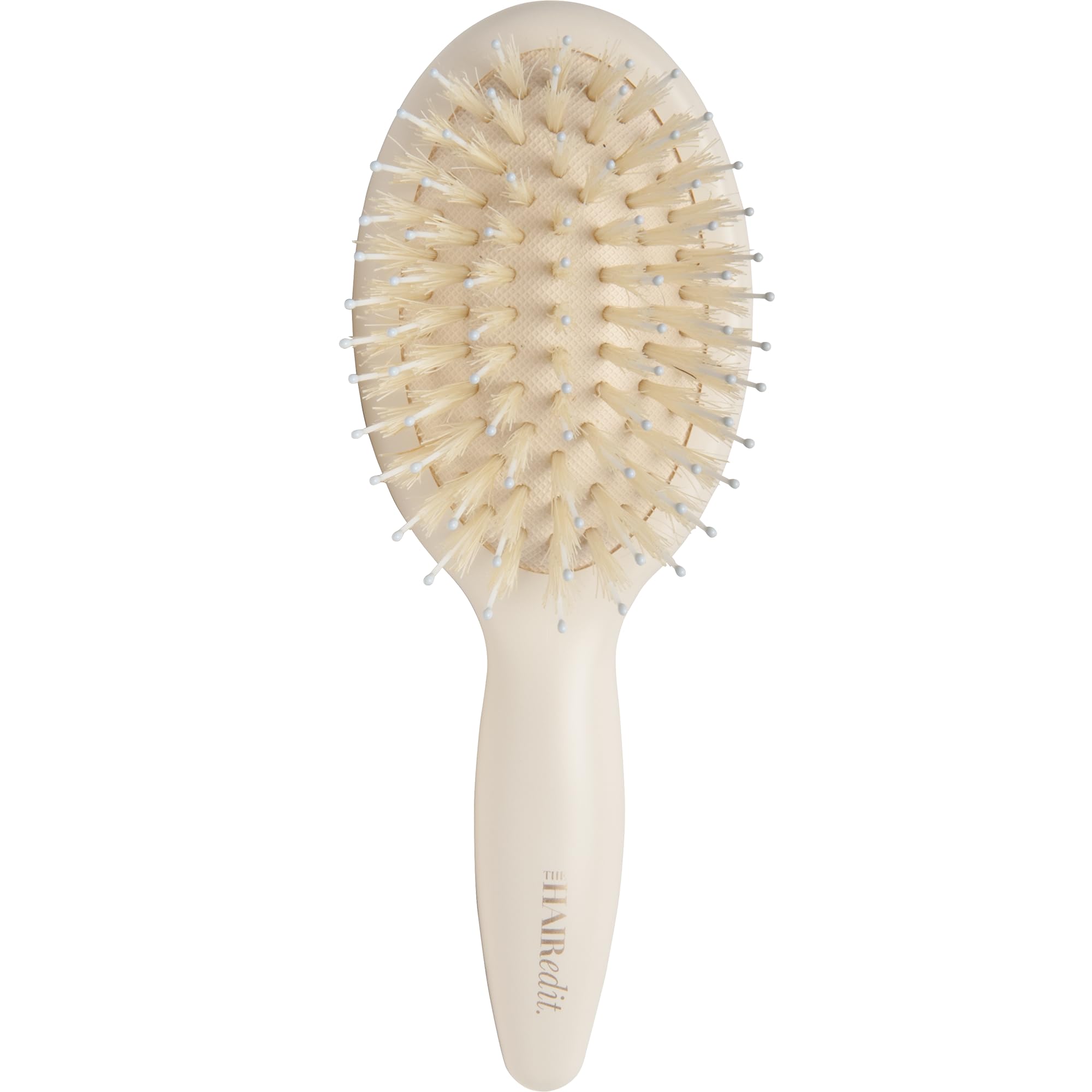The Hair Edit mini brush close-up showing boar bristles for gentle detangling