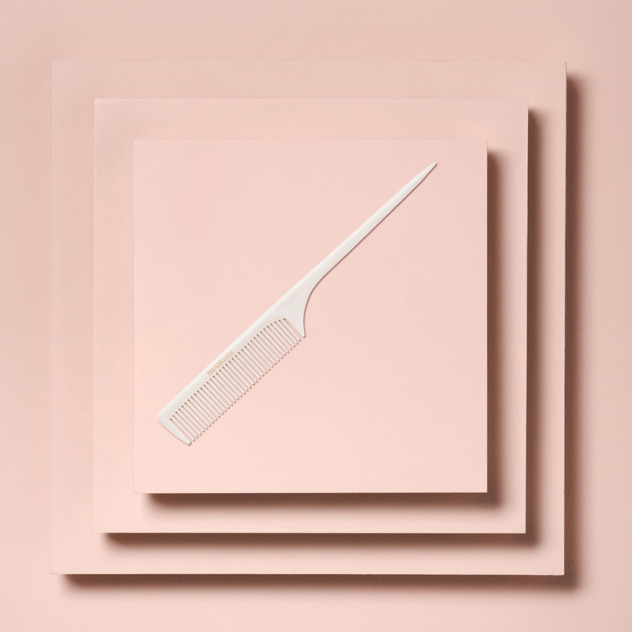 The Hair Edit precision parting tool aids sleek updos and braids.