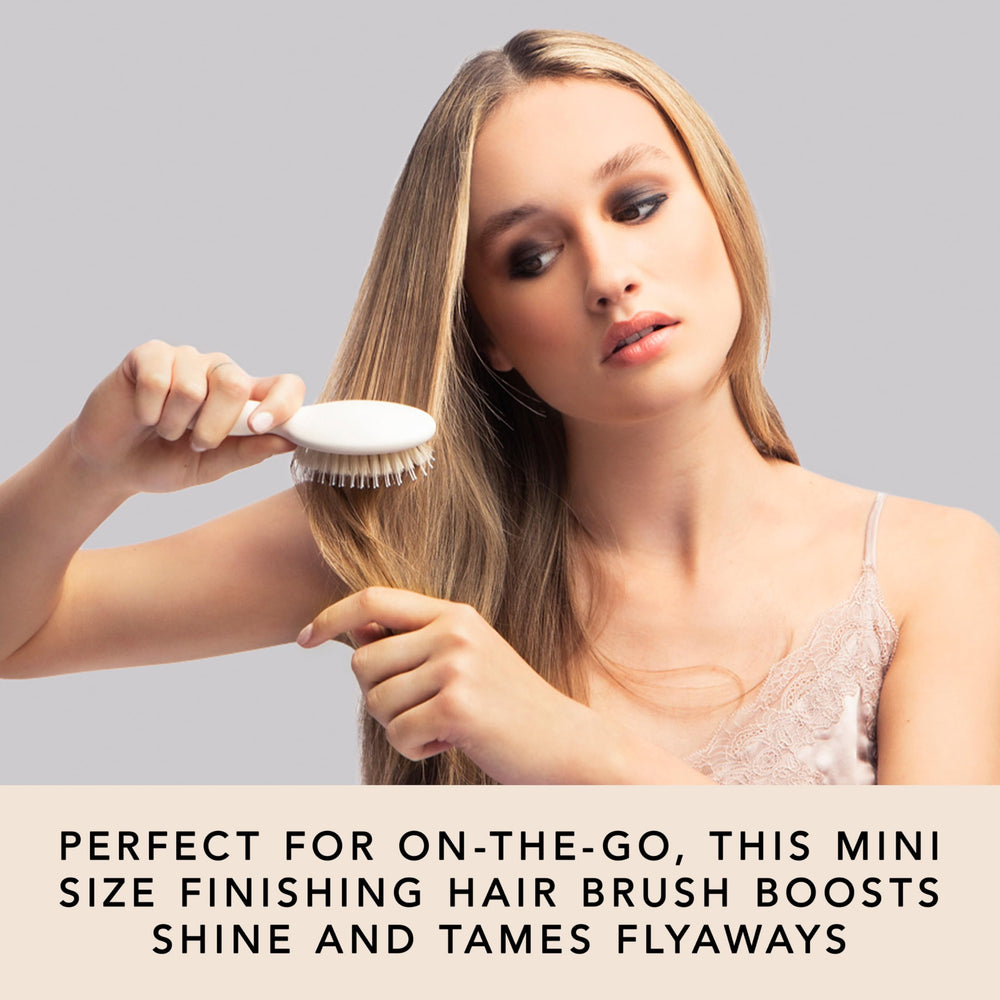 The Hair Edit brush massaging the scalp while detangling gently