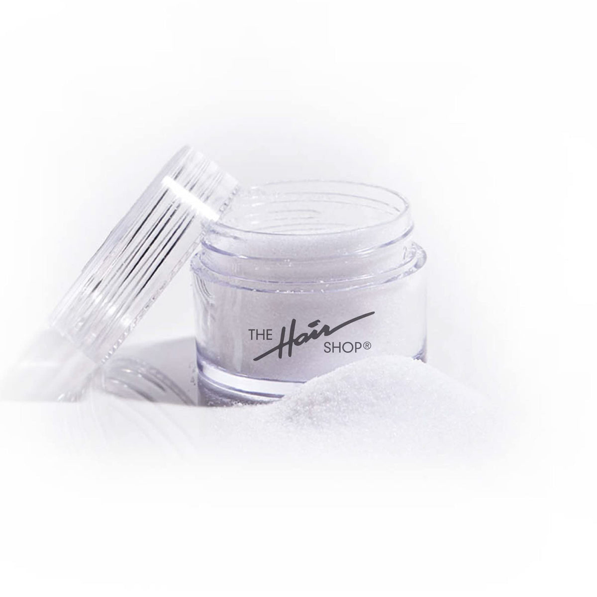 The Hair Shop keratin glue powder jar for re-tipping and reuse of extensions.