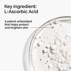 The Ordinary vitamin C powder being scooped for a customizable routine.