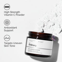 Mixing powder with serum to create a personalized vitamin C treatment.