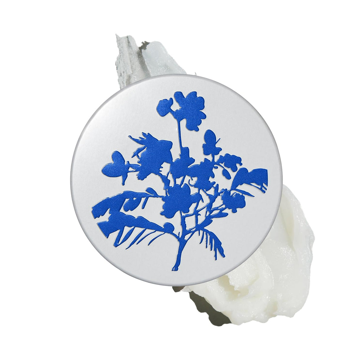 The Outset Botanical Barrier Rescue Balm tin for on-the-go hydration.