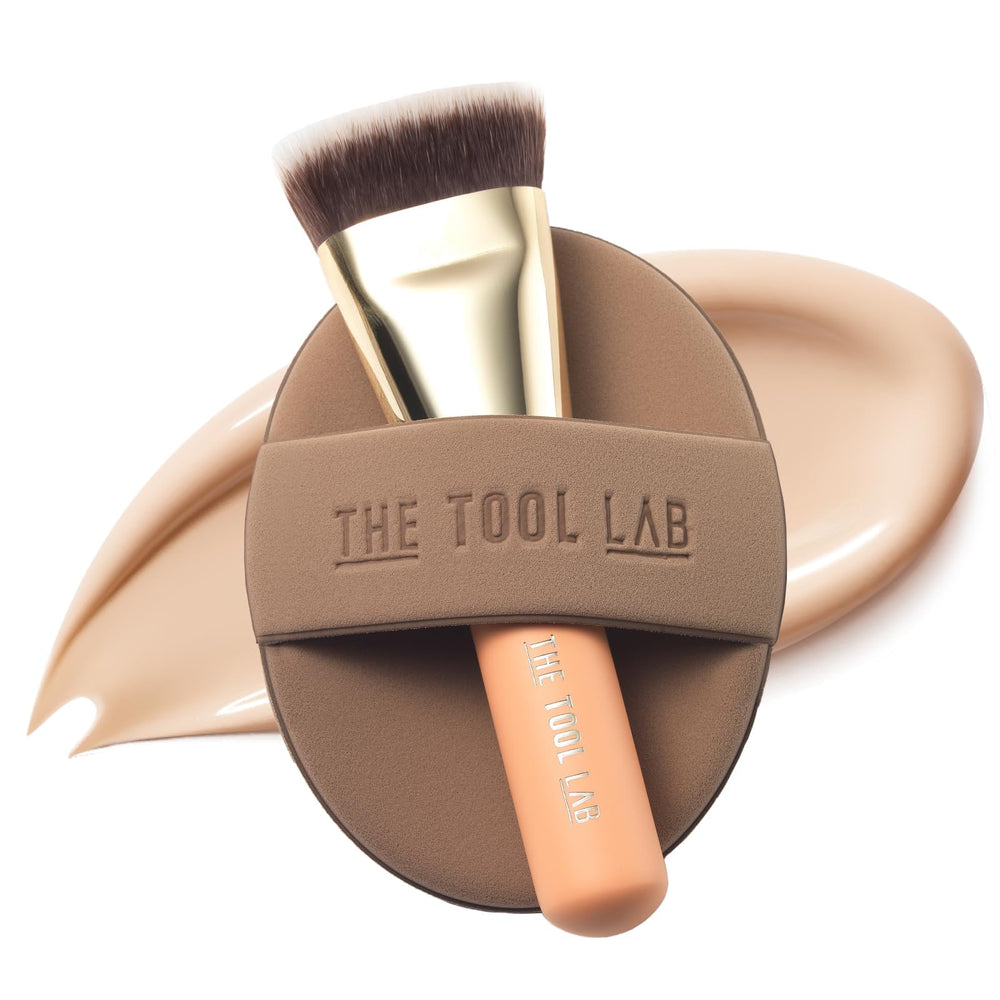 The Tool Lab All Day Fitting Duo Glow flat-top brush for precise, even foundation application.