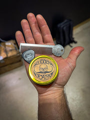 The Vintage Grooming Co. Platinum Death Grip comb for precise styling.