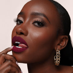 Duo de cuidado labial Juicy Pout de The Lip Bar para labios lisos.