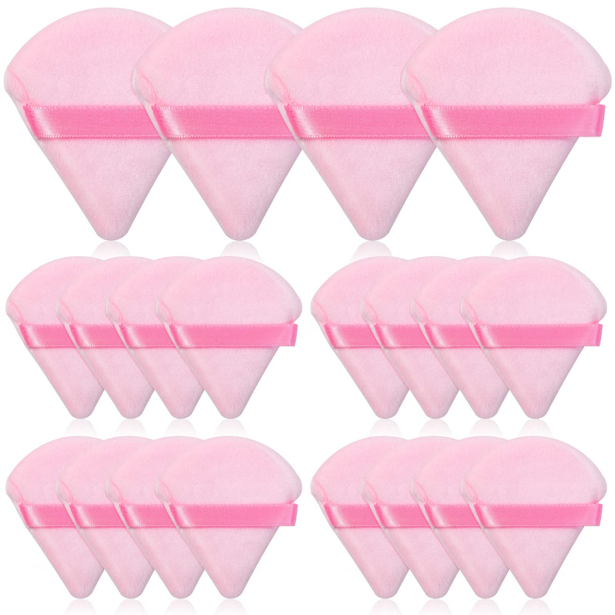 Thrilez pink triangle powder puff for precise powder placement on the face.