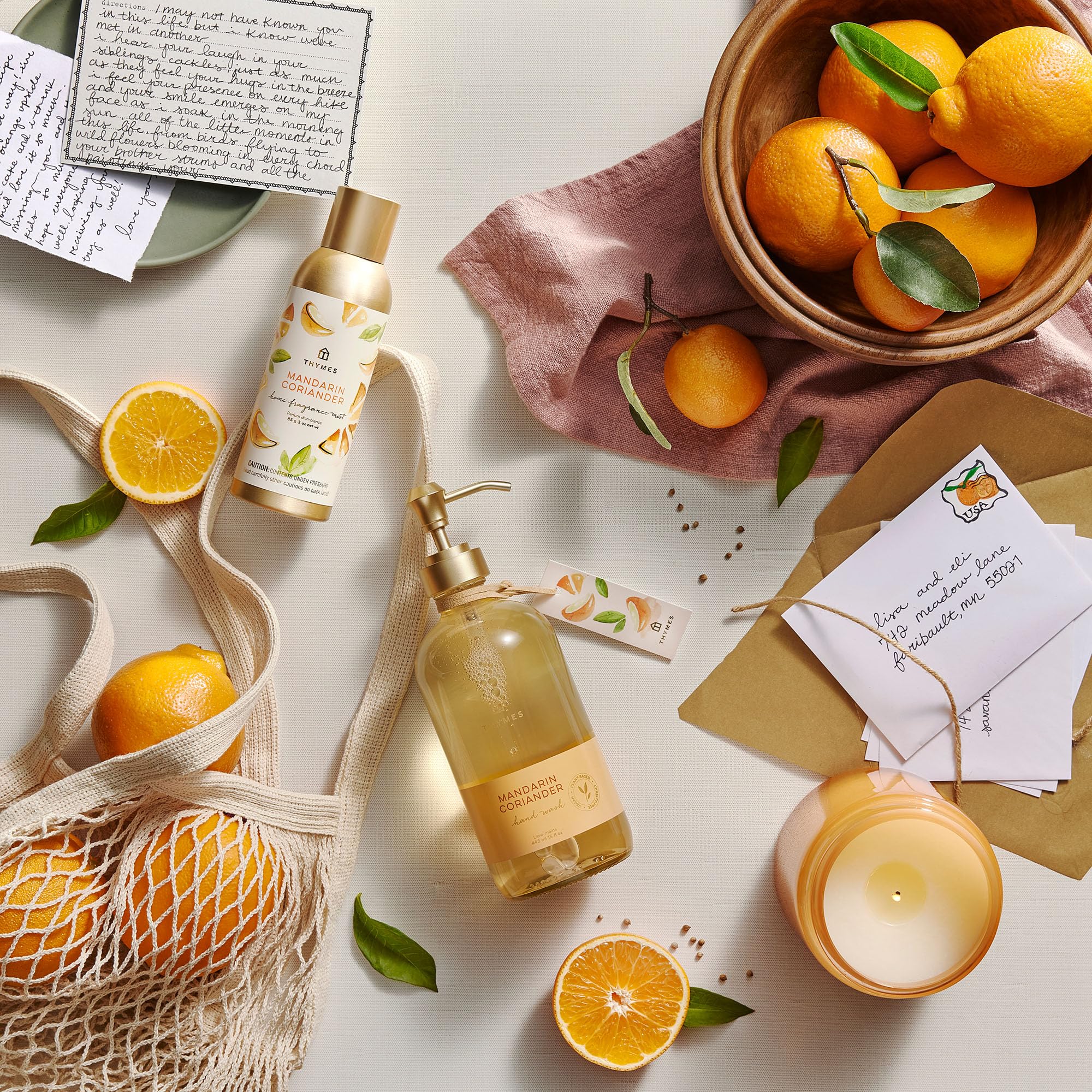 Thymes Mandarin Coriander hand wash in action dispensing lather