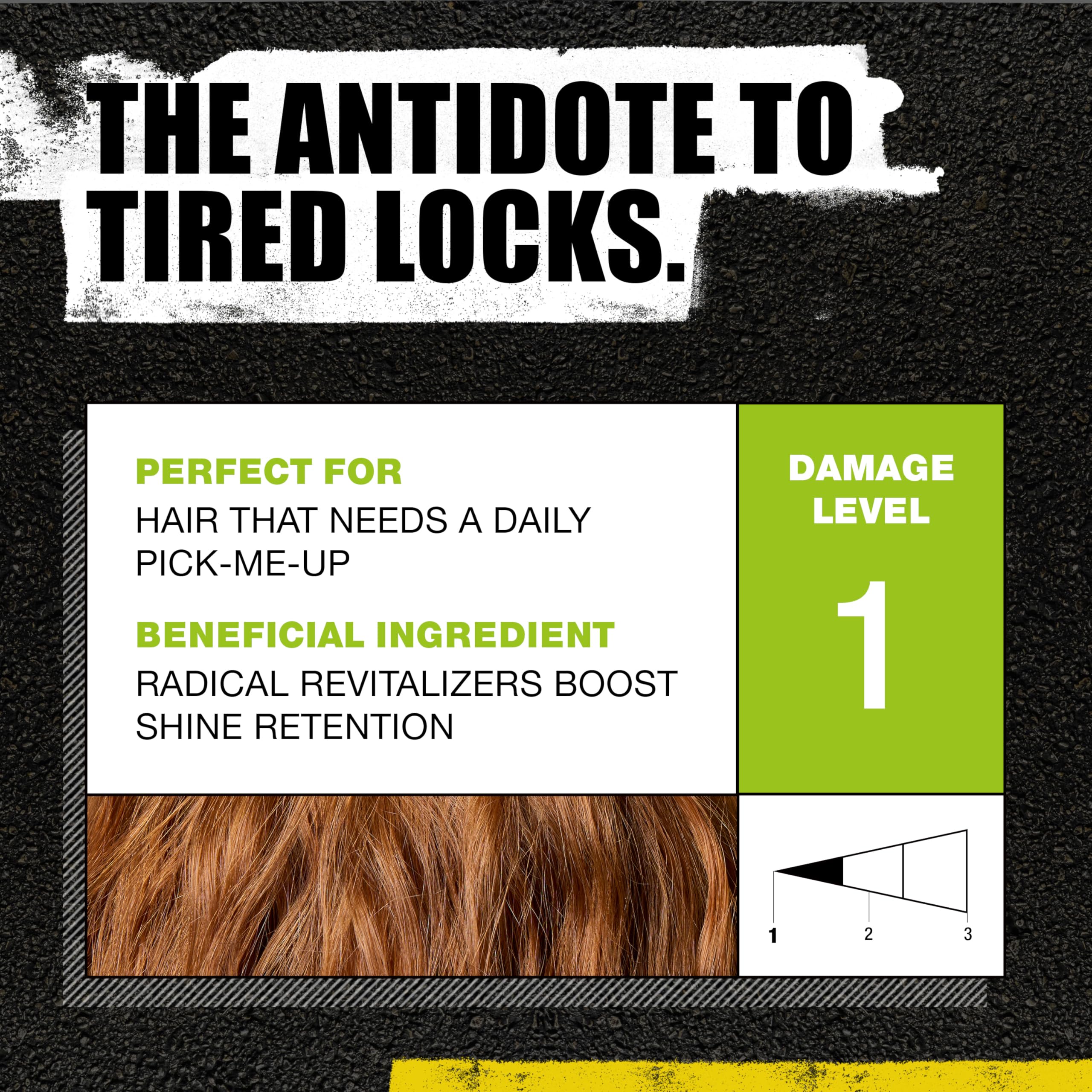 Bed Head by TIGI Re-Energize conditioner close-up emphasizes smoothing formula for soft, manageable hair.
