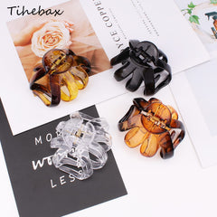 Tihebax 4 pack amber clips with eight-tooth grip for anti slip hold.