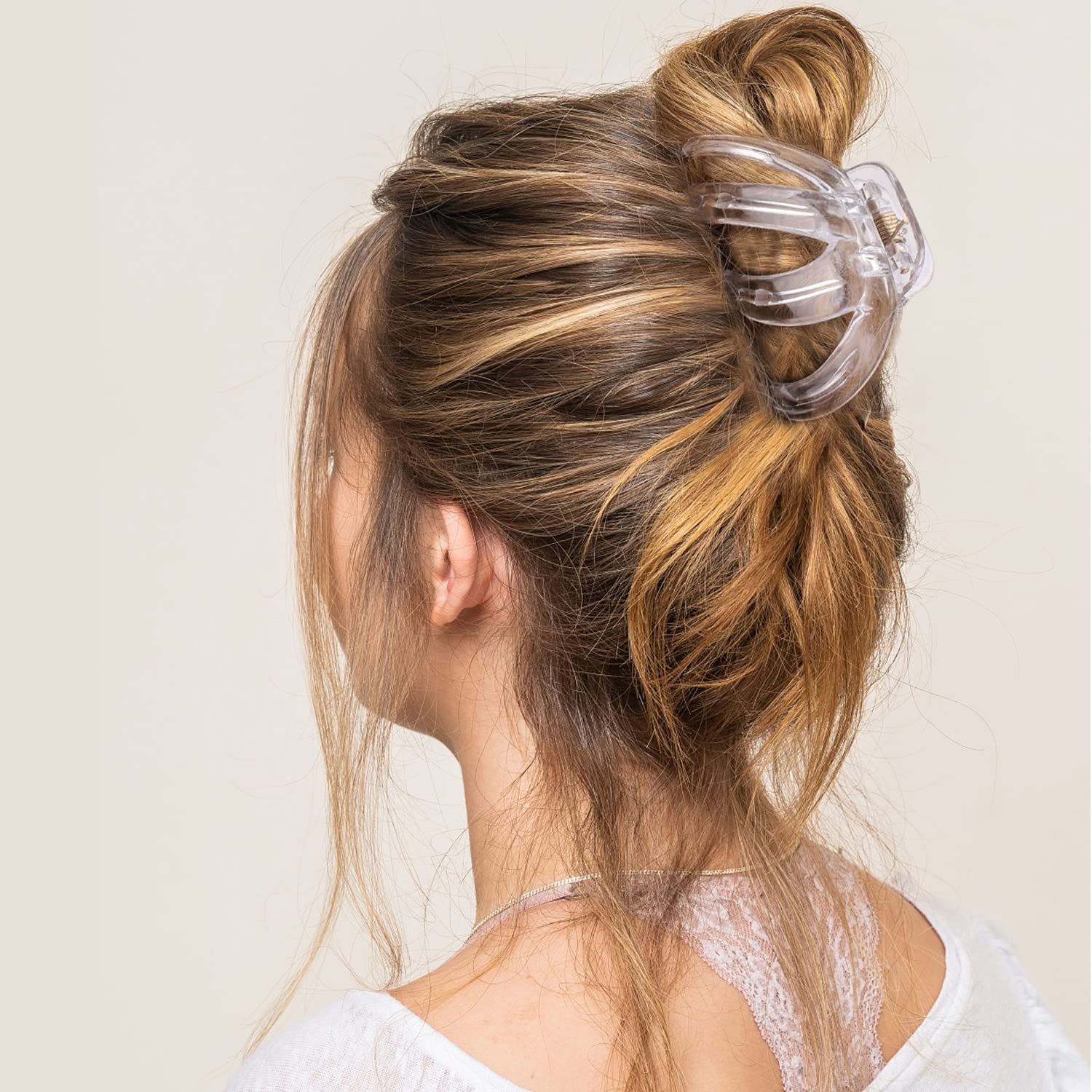 Tihebax black jumbo clip holding a sleek bun with secure all day hold.