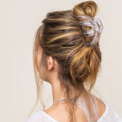 Tihebax black jumbo clip holding a sleek bun with secure all day hold.