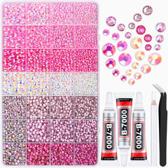 Caja TINKRSTUFF con 28 rejillas de piedras resina rosadas para manualidades.