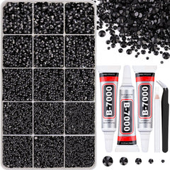 Piedras de resina negra de TINKRSTUFF en caja con rejillas para manualidades.