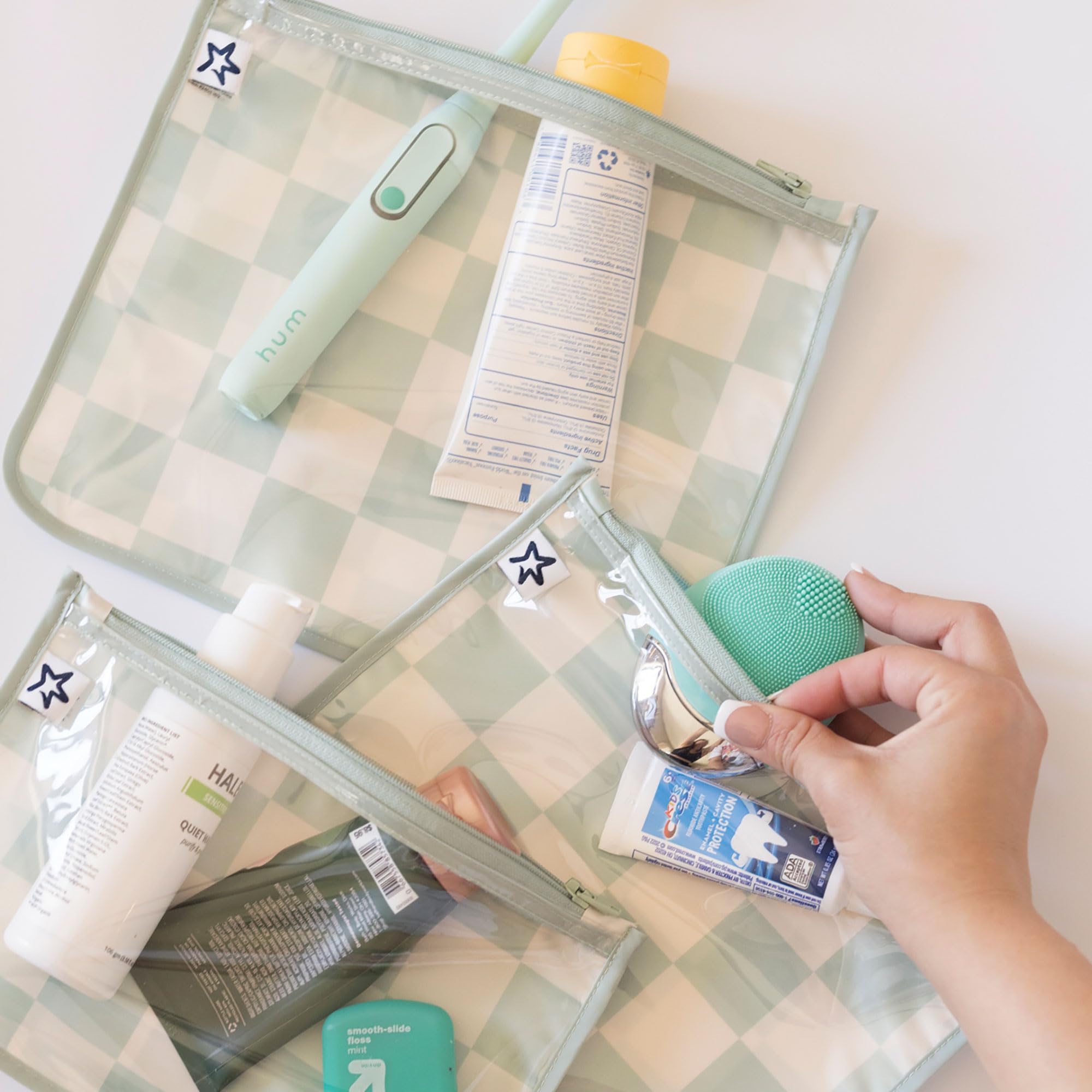 Medium pouch in Sage Checkers, easy access for wipes and snacks.