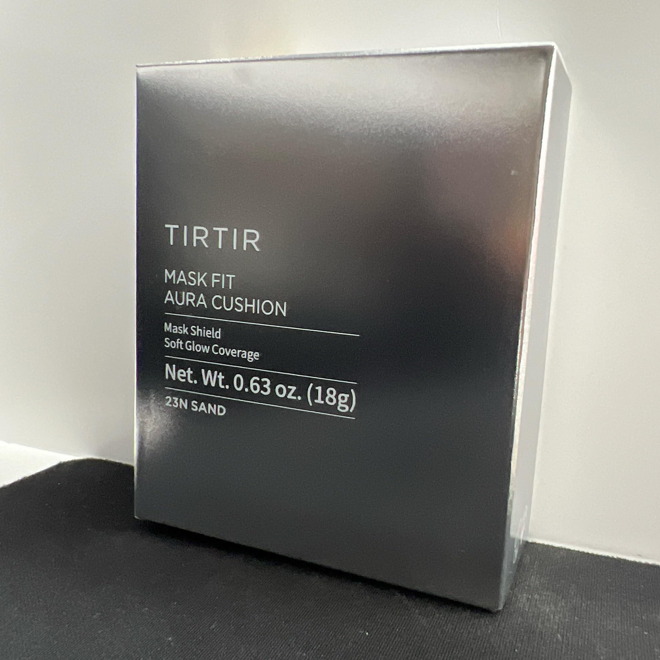 Close-up of the dispense button on TIRTIR Mask Fit Aura Silver Cushion