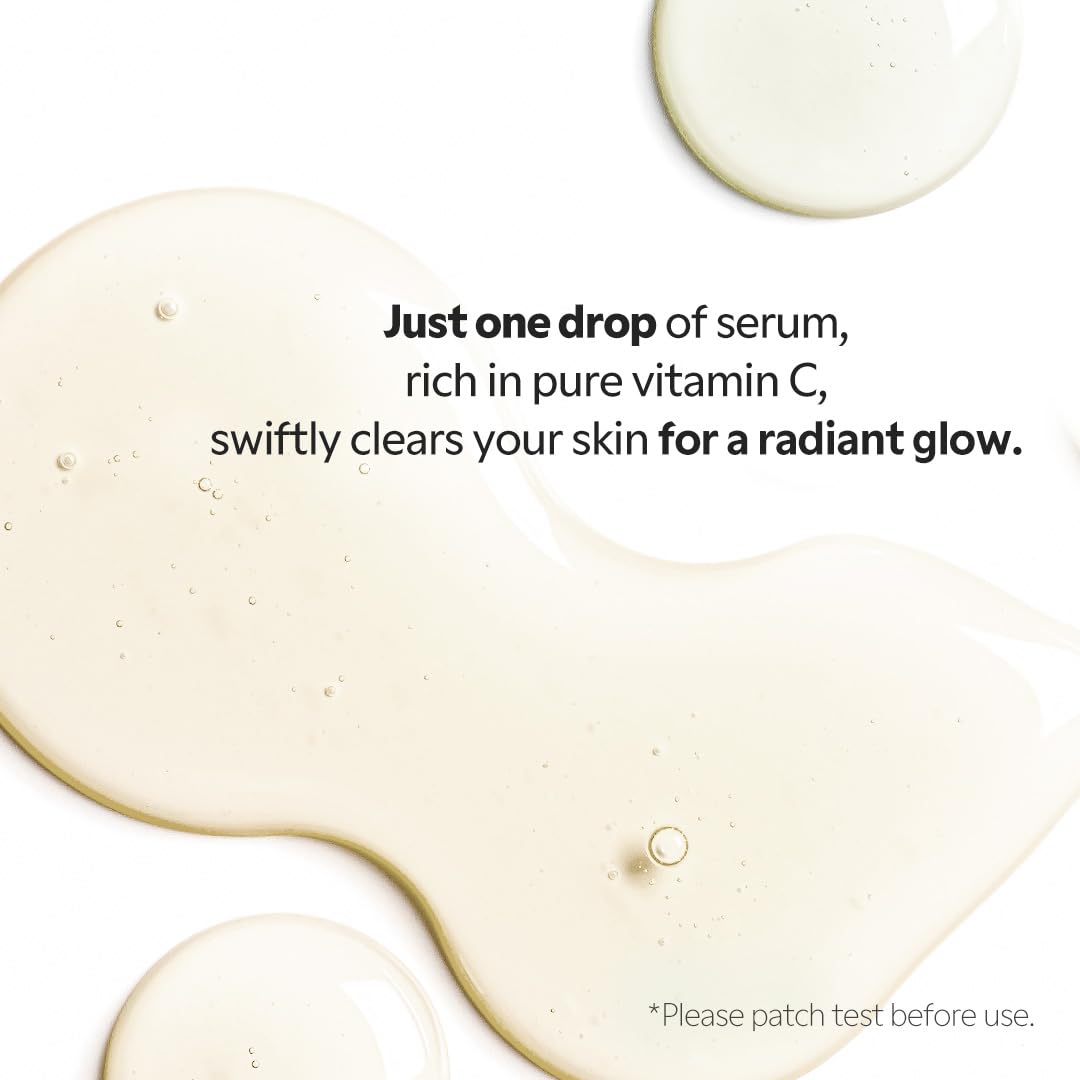Drop of serum gliding across skin blurs minor imperfections.